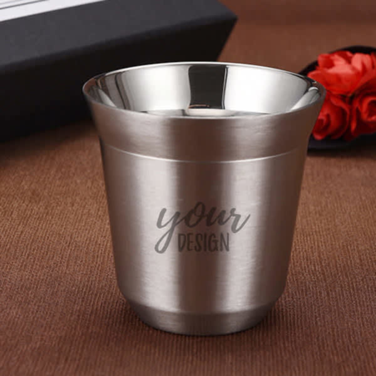 A stainless steel coffee mug with a sleek silver finish and a branding placeholder.