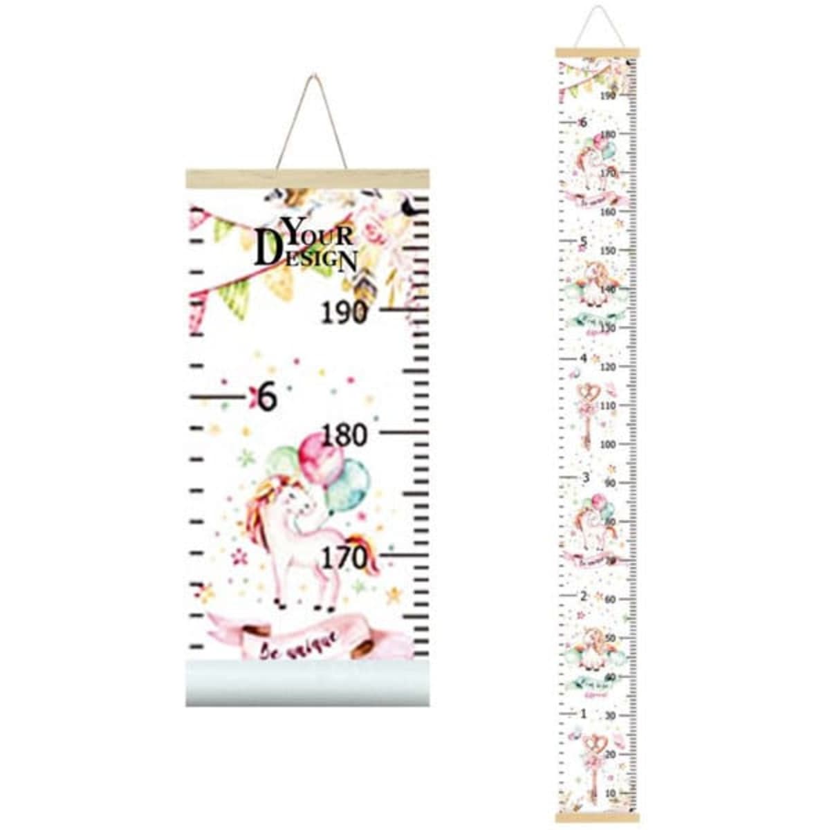 A decorative kids' growth chart measurement ruler featuring playful designs in pink and white, with a hanging mechanism.