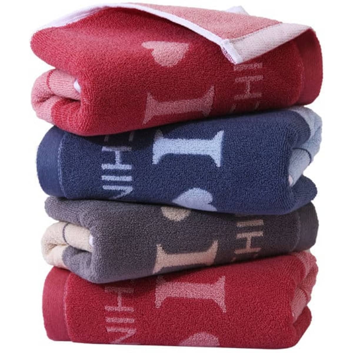 A stack of four custom cotton towels in red, navy blue, grey, and cream, with a logo on one towel.