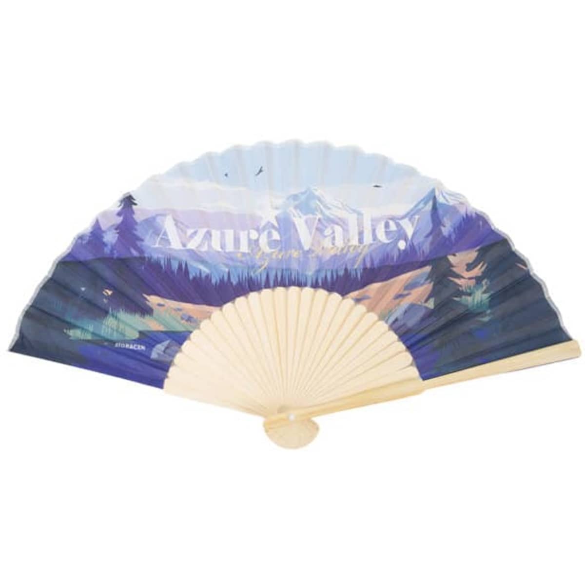 A handheld fabric folding fan featuring a scenic landscape design in shades of blue and green with beige accents.