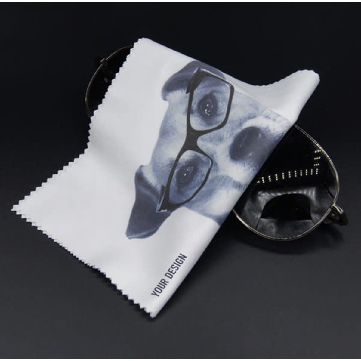 A personalised glasses cleaning cloth featuring a dog's face wearing glasses, with a black background.