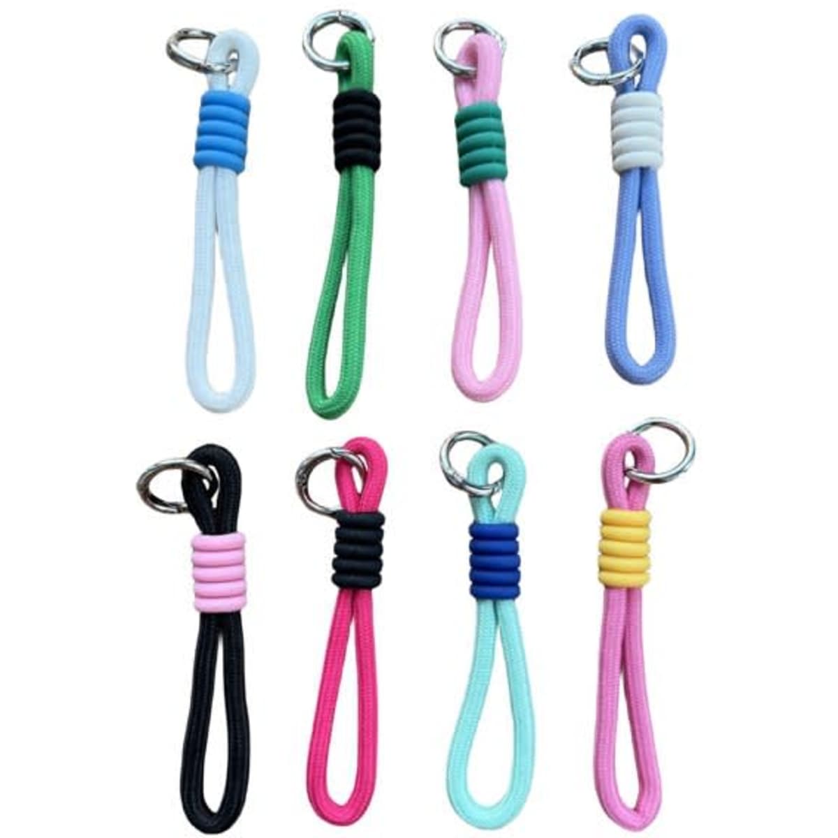 A collection of double layer wrist lanyard keyrings in various colours, including blue, green, pink, and black, with metal keyring attachments.