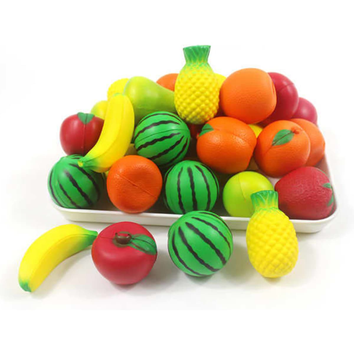 A collection of brightly coloured stress balls shaped like various fruits, including pineapples, watermelons, and bananas.
