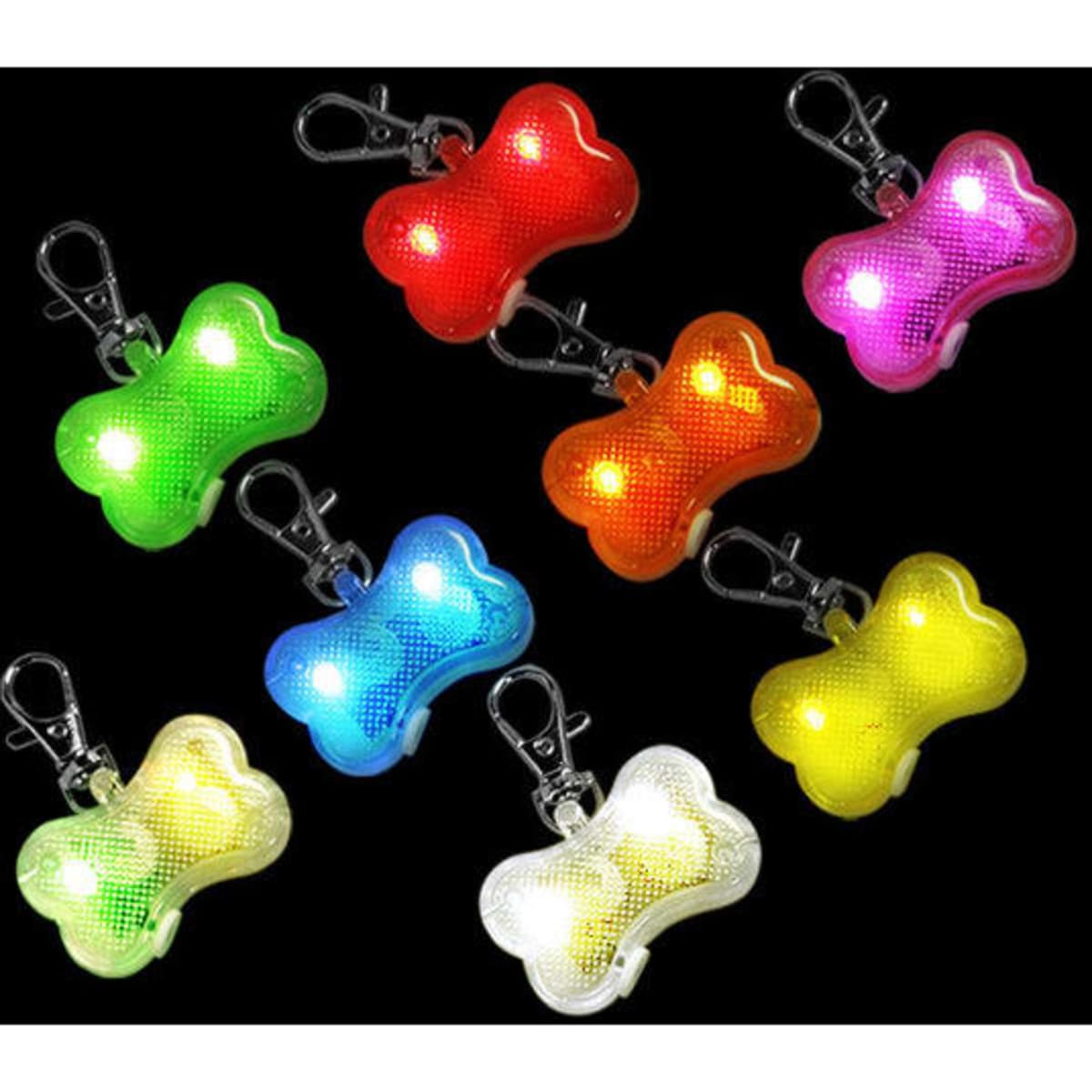 A collection of LED clip-on pet safety lights in various colours including red, green, blue, yellow, and pink.
