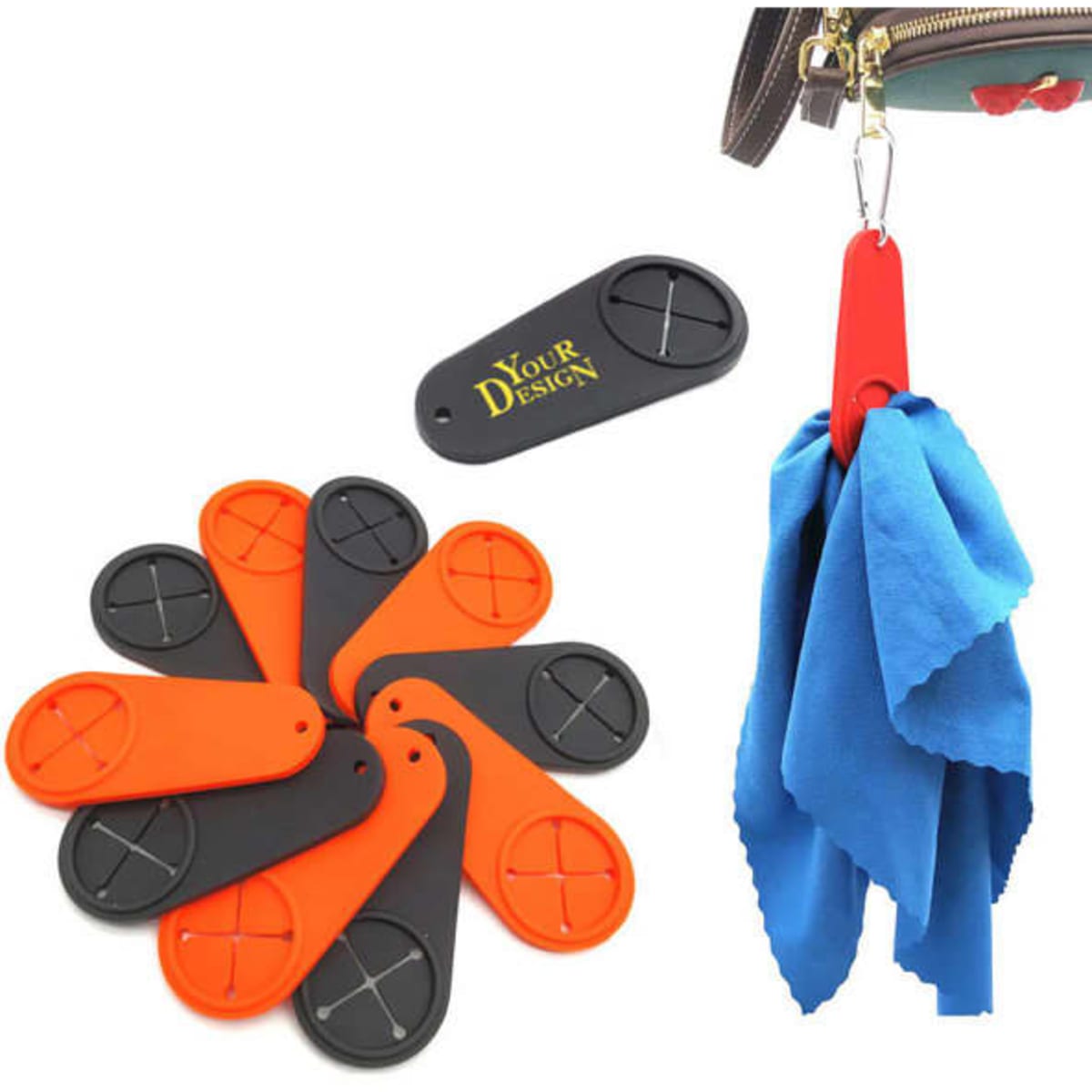 A set of golf towel holders in red, orange, and black, with one attached to a bag holding a blue towel.