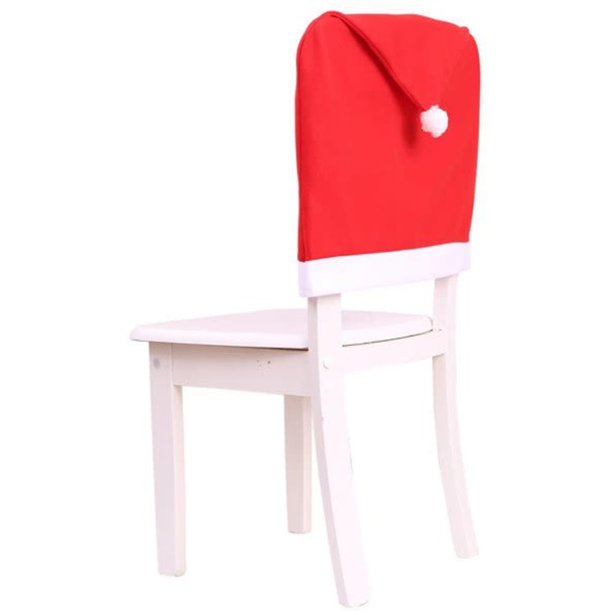 A red Santa hat chair cover with a white trim and pom-pom, draped over a white chair.