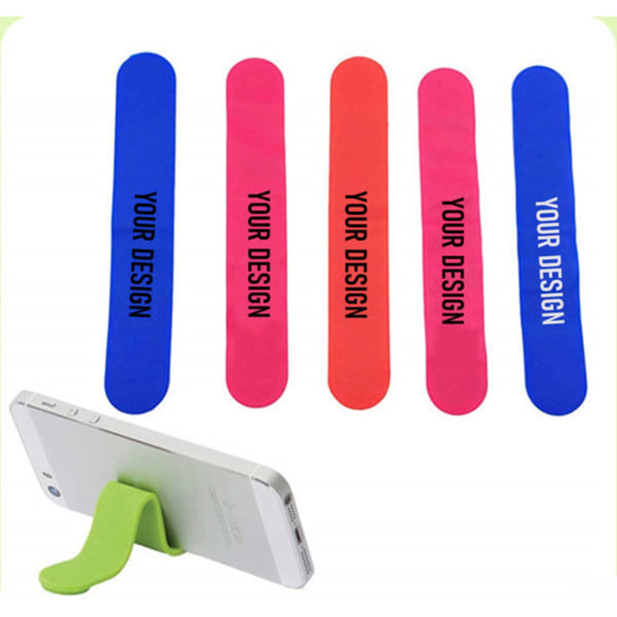 A smartphone rests on a green silicone holder, with four coloured clips in blue, pink, and red nearby, each featuring a logo.
