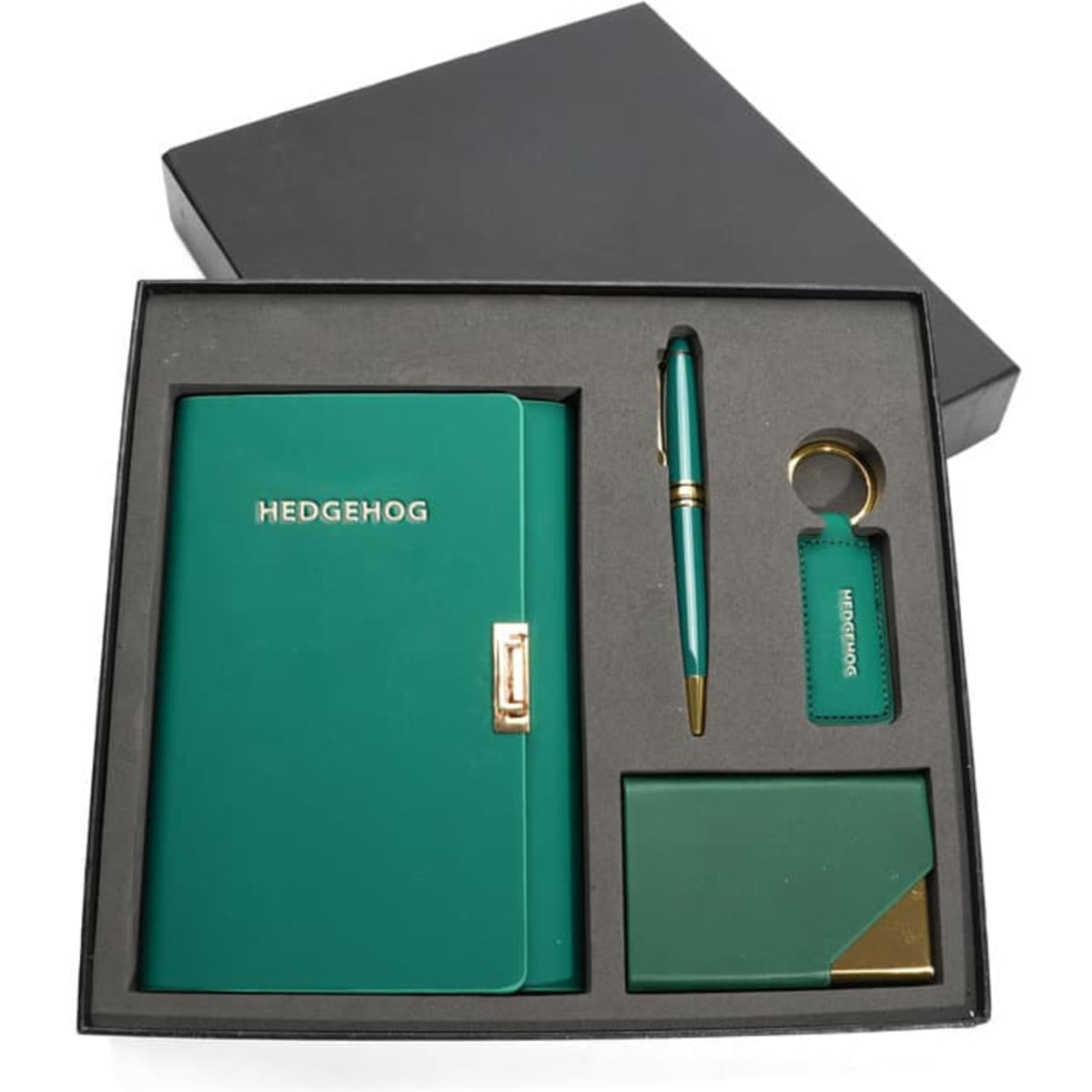 A green A6 PU spiral notebook set featuring a pen, keyring, and cardholder, presented in a black gift box.