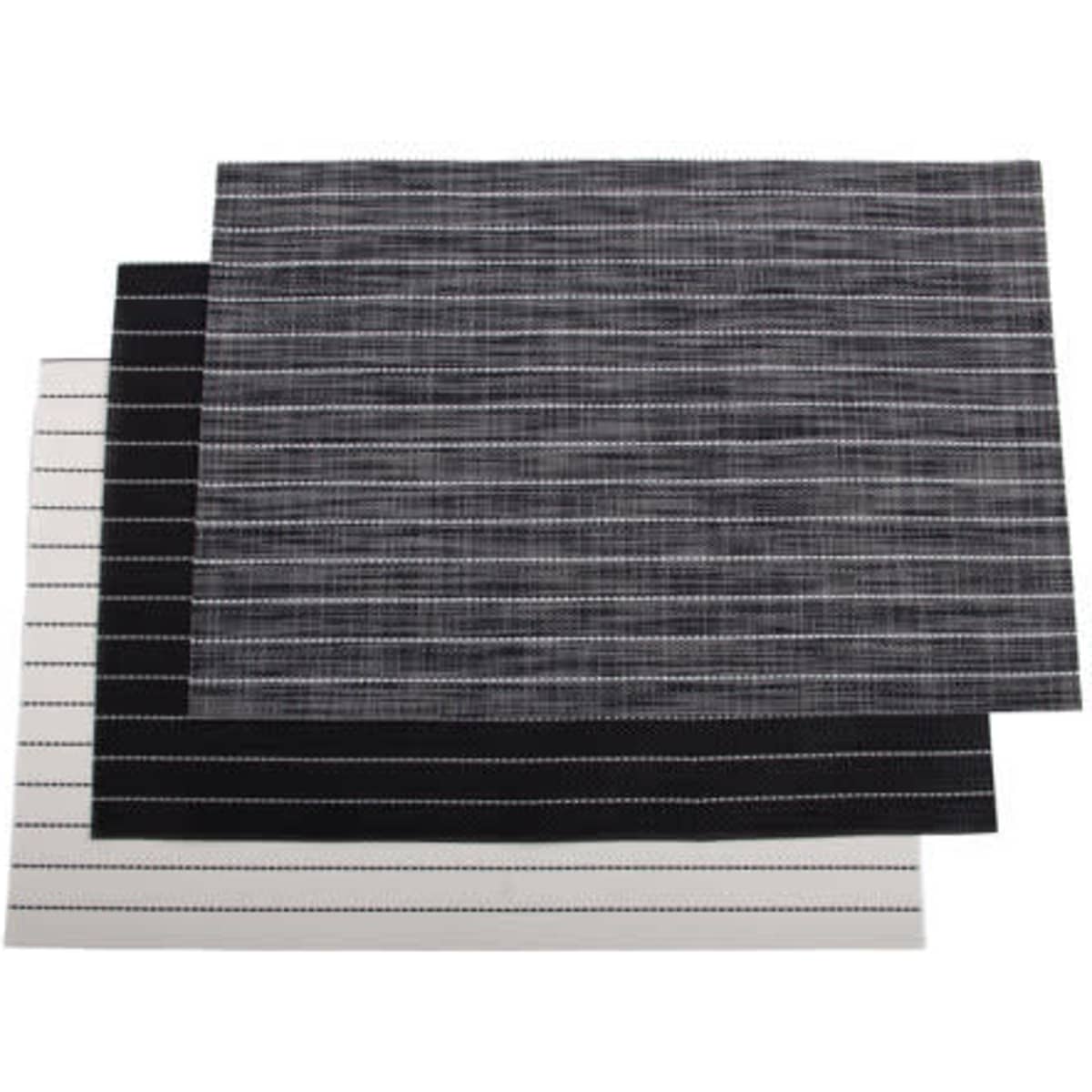 A set of three PVC striped placemats in black, white, and grey, featuring a subtle striped design.