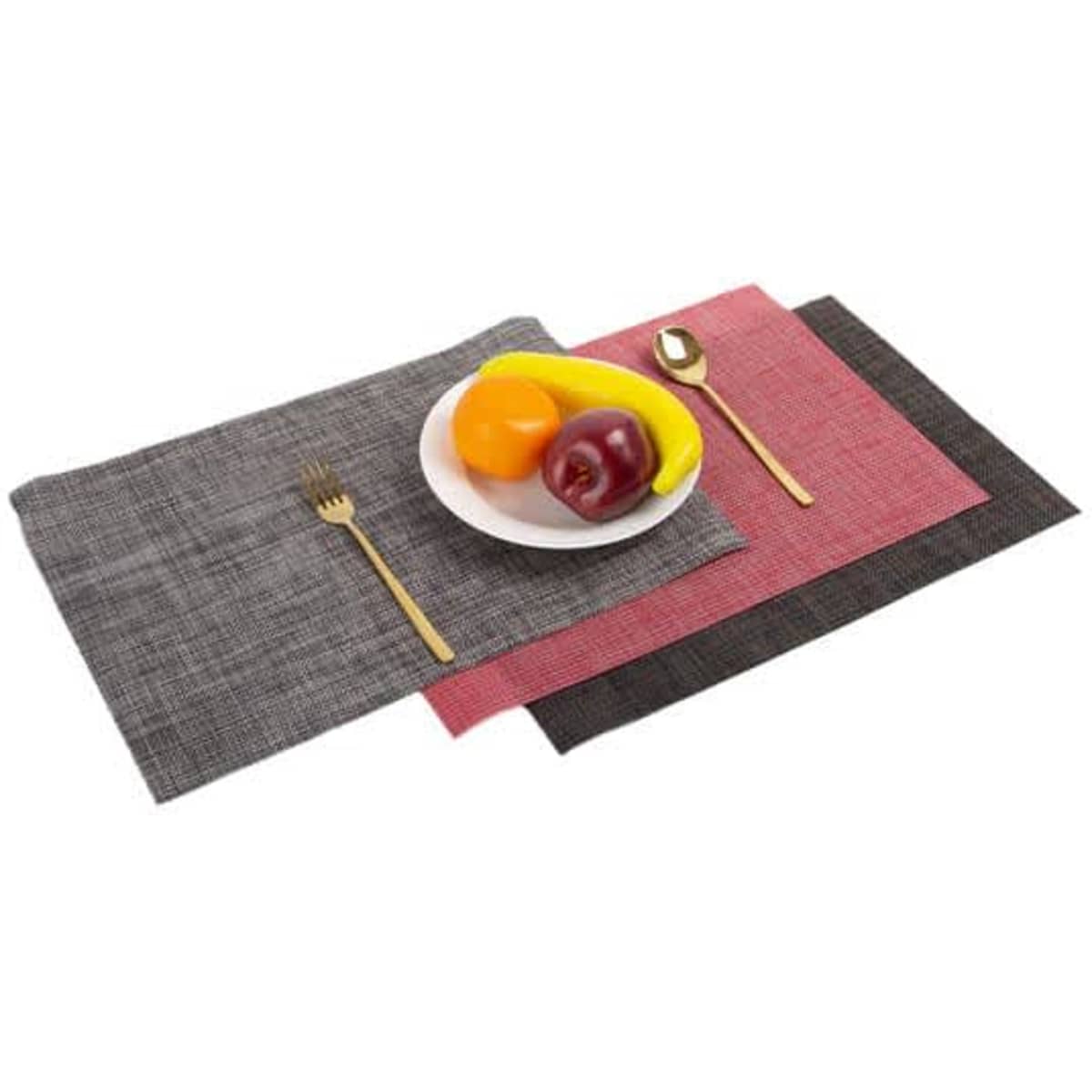 A set of PVC heat insulation anti-slip placemats in grey and red, featuring a plate of fruit and a gold fork.