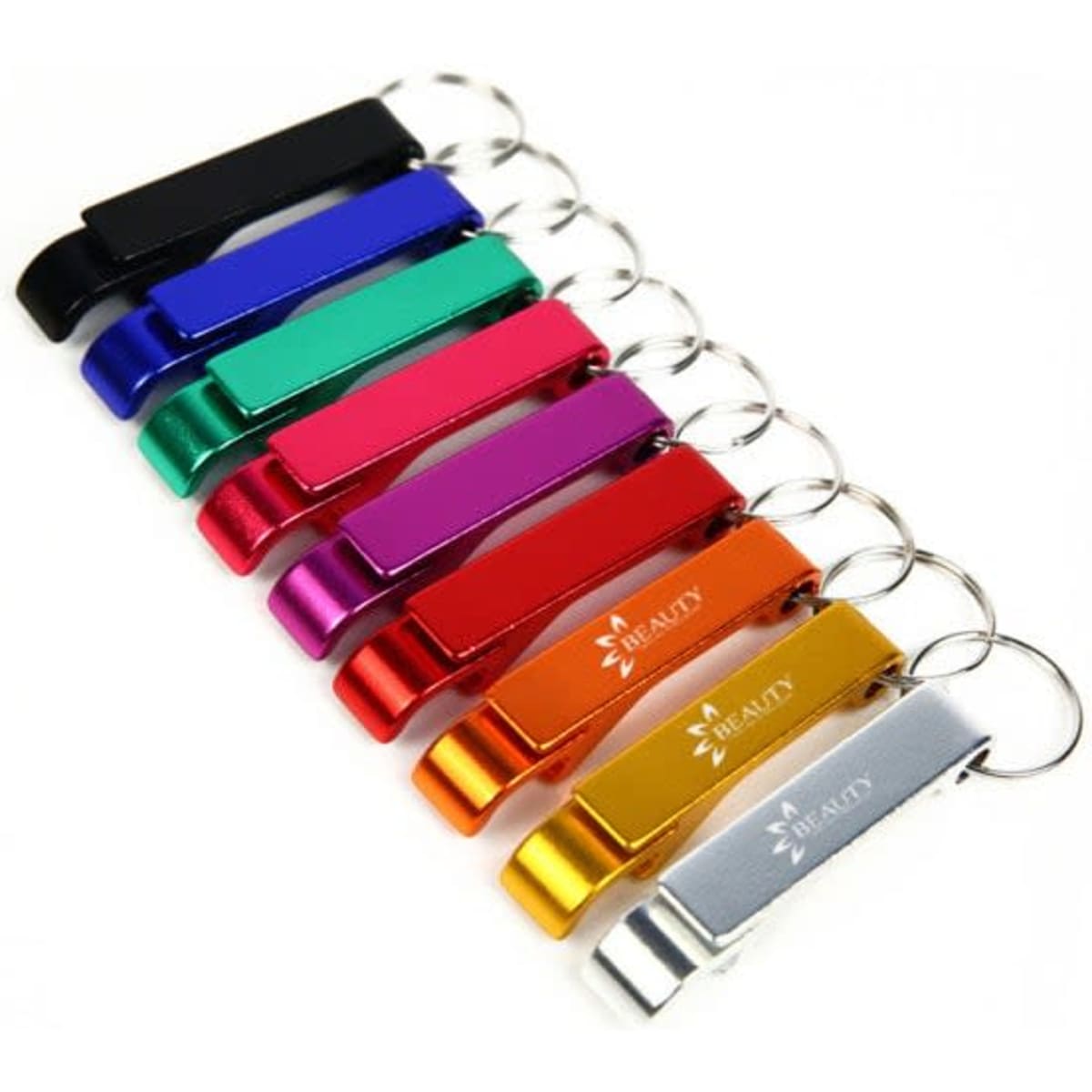 A drink bottle opener keyring collection featuring various colours: black, green, pink, red, purple, blue, and gold, with logos.