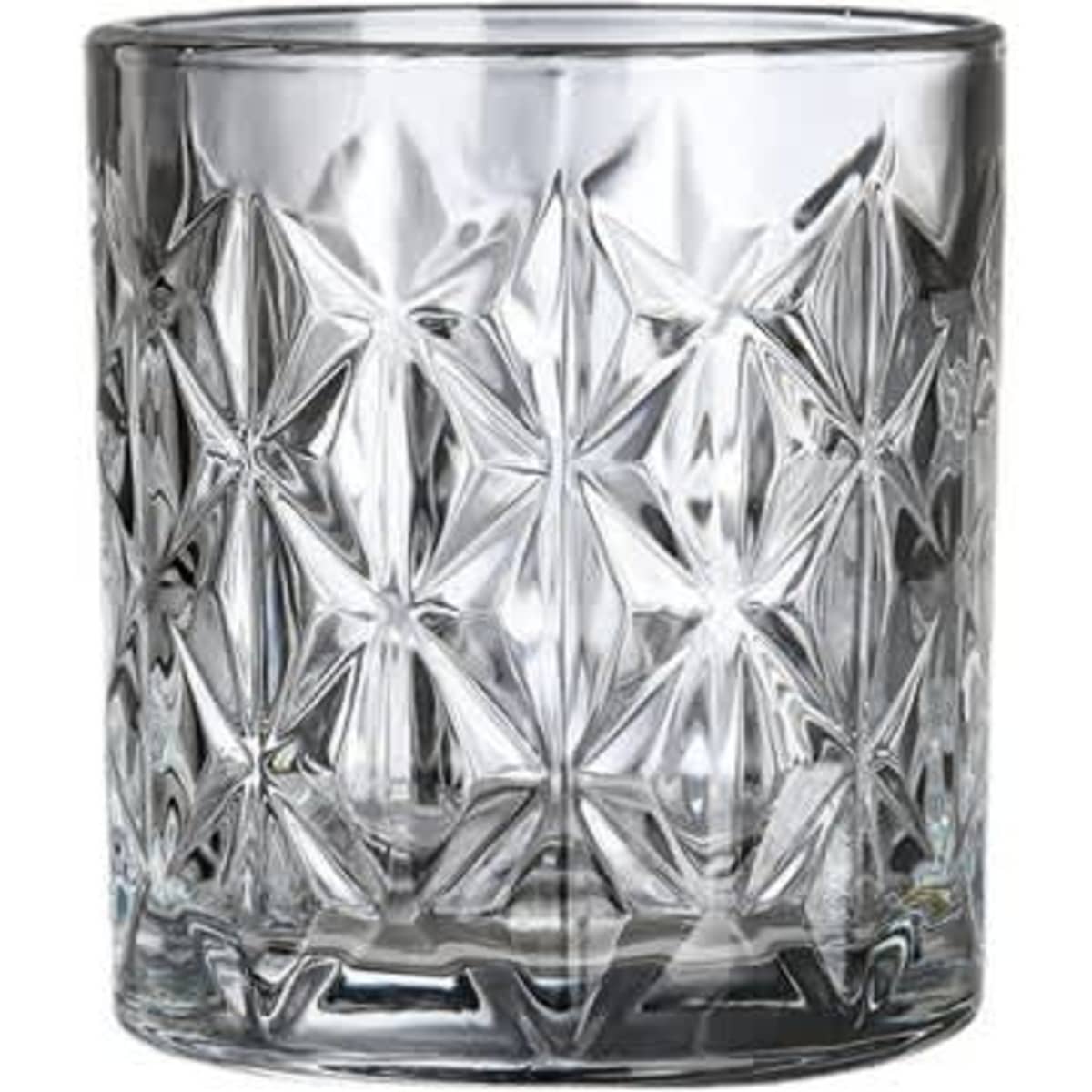 A clear glass tumbler with a textured star pattern, ideal for whiskey or other beverages.