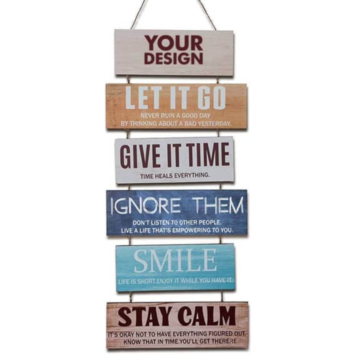 A decorative wooden wall hanging sign with multiple small plaques in various colours featuring motivational phrases.