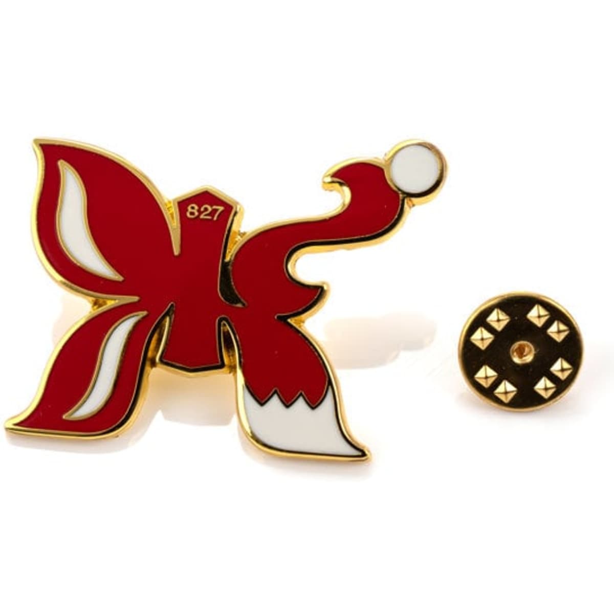 A red and white enamel badge in the shape of a butterfly, featuring a gold outline and a circular backing with studs.