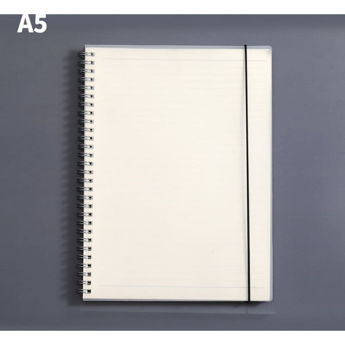 A5 transparent cover spiral notebook with lined pages and a black elastic band. Features a clean, minimalist design.