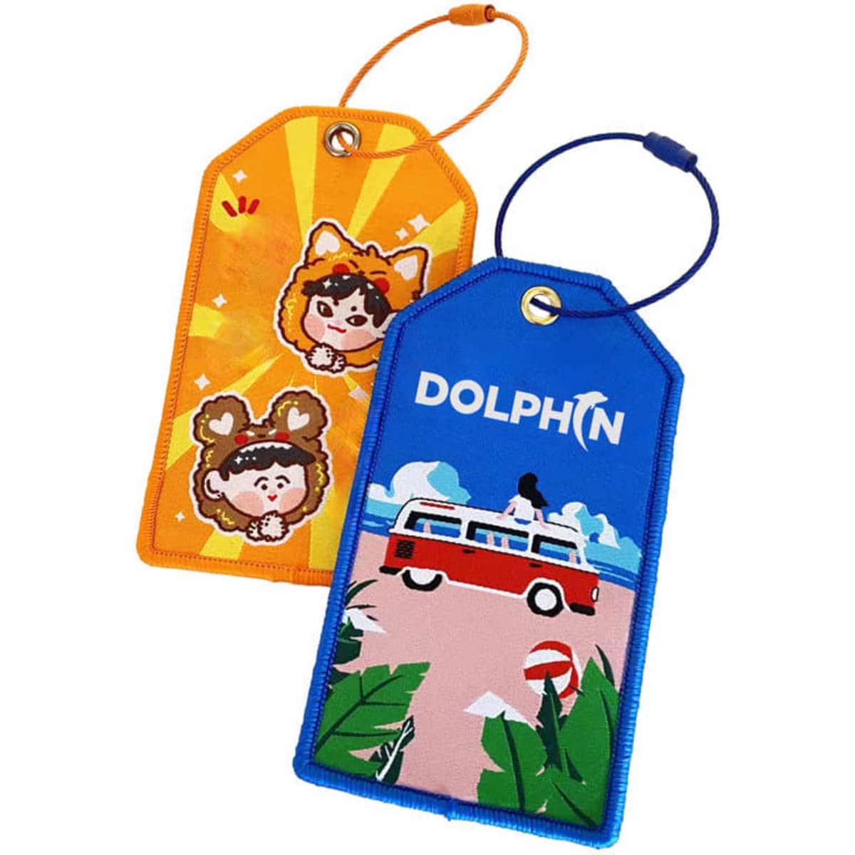 Two custom embroidered luggage tags in orange and blue, featuring playful cartoon designs and a logo.
