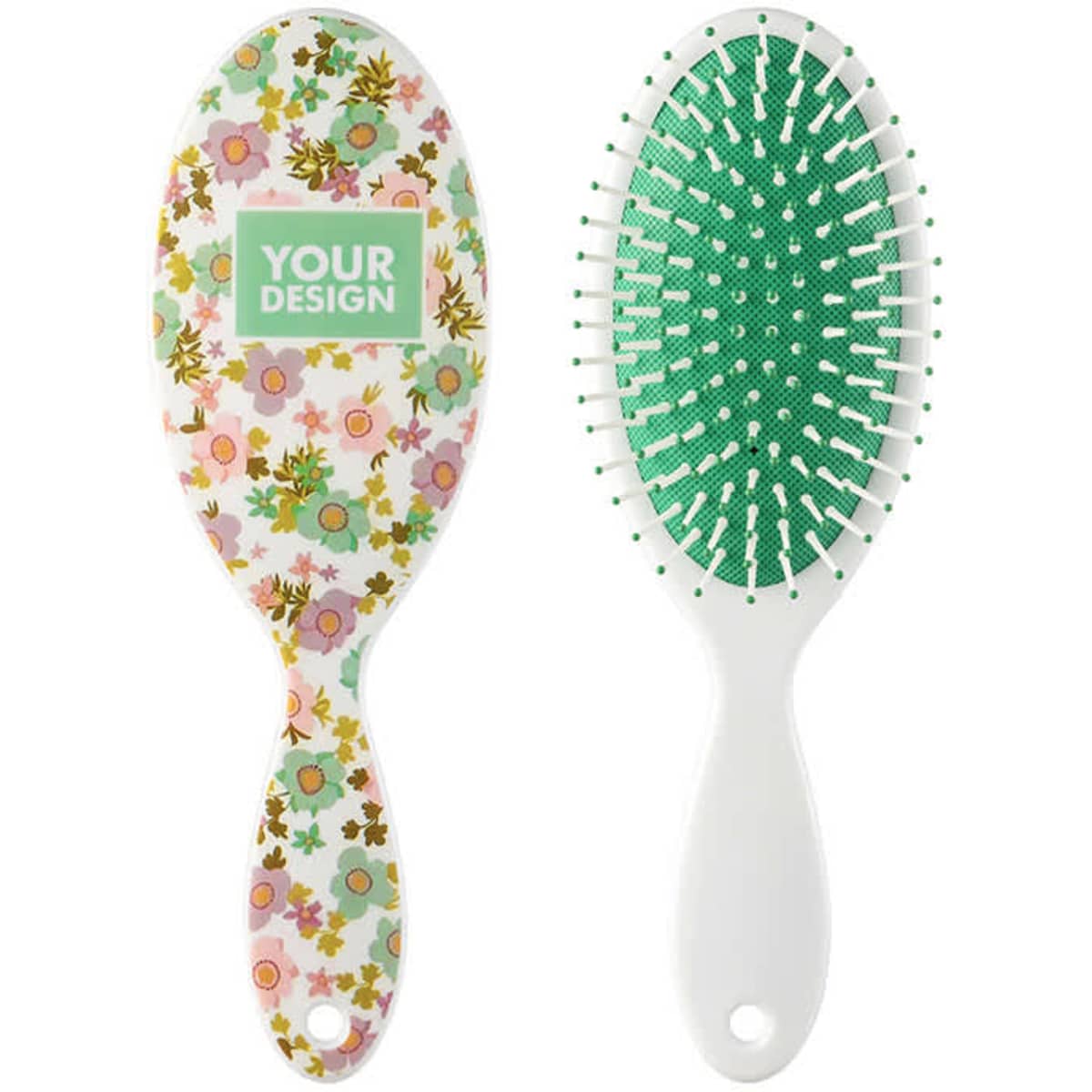 A paddle hair brush featuring a floral design on one side and a green bristle pad on the other. It has a white handle.