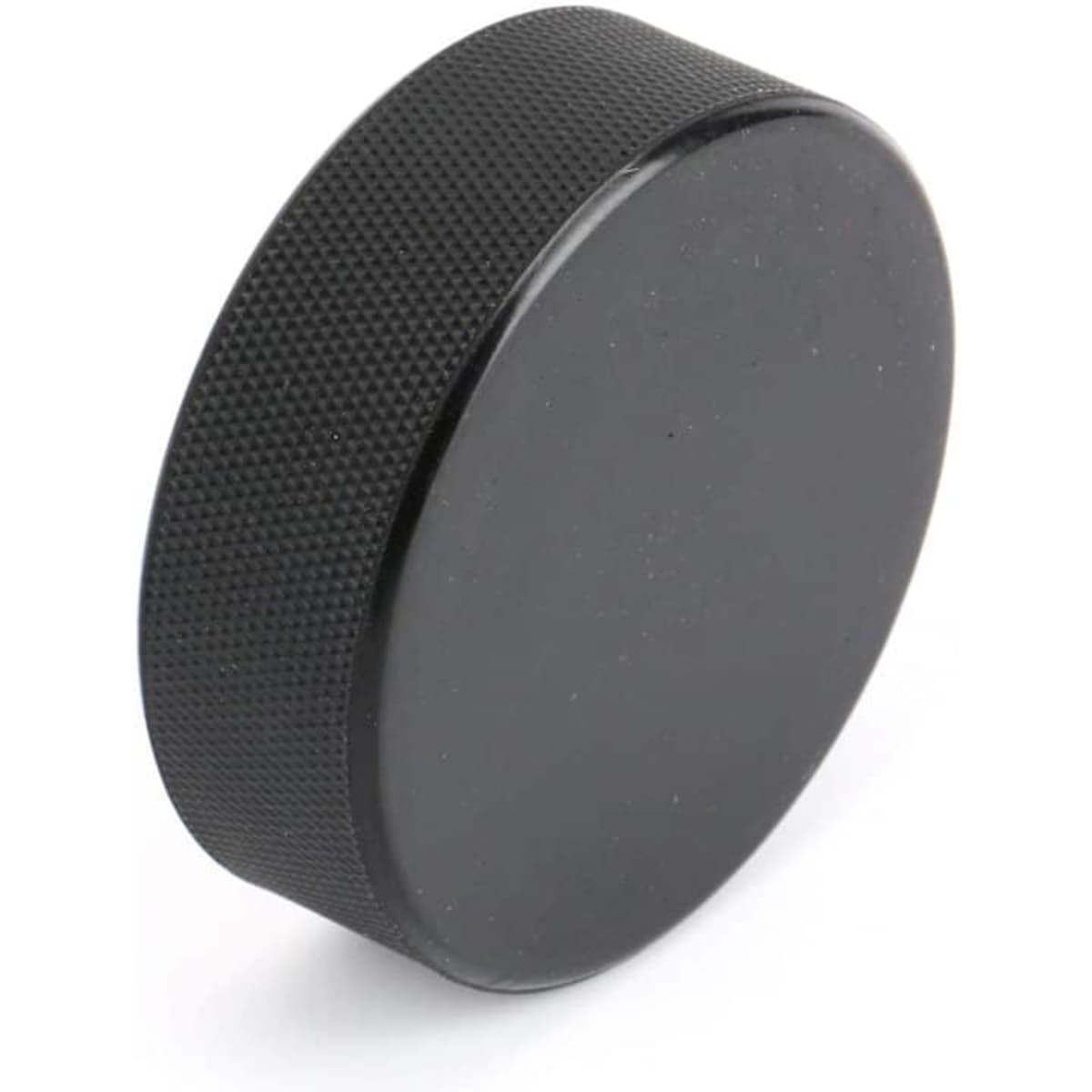 A black rubber ice hockey puck with a textured surface, featuring a logo.