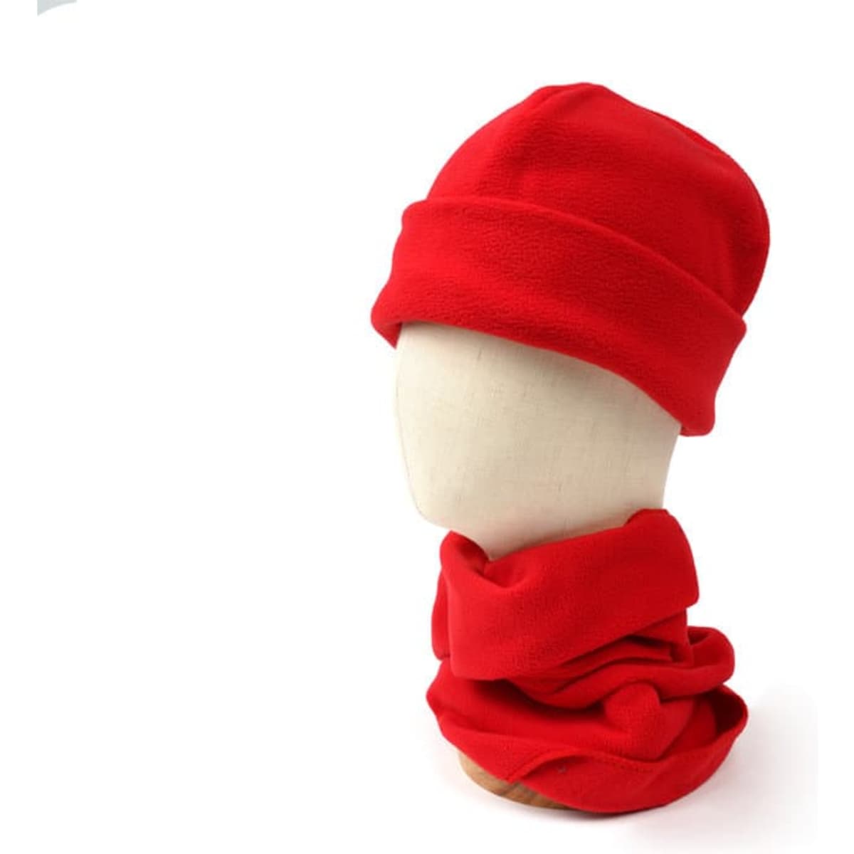 A red fleece beanie and matching neck warmer displayed on a mannequin head, both in a soft texture.