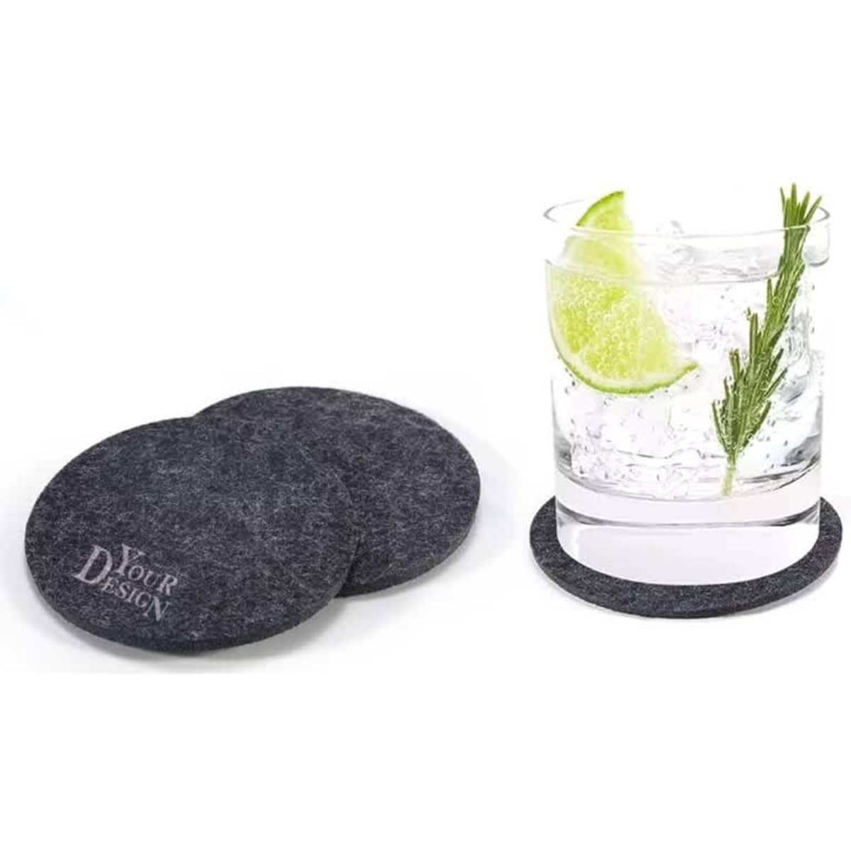 A drink glass with lime and herbs sits on a round grey felt coaster, with two additional coasters nearby.