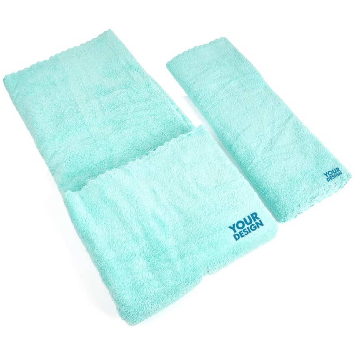 A set of two coral fleece bathroom towels in a mint green colour, featuring a logo.