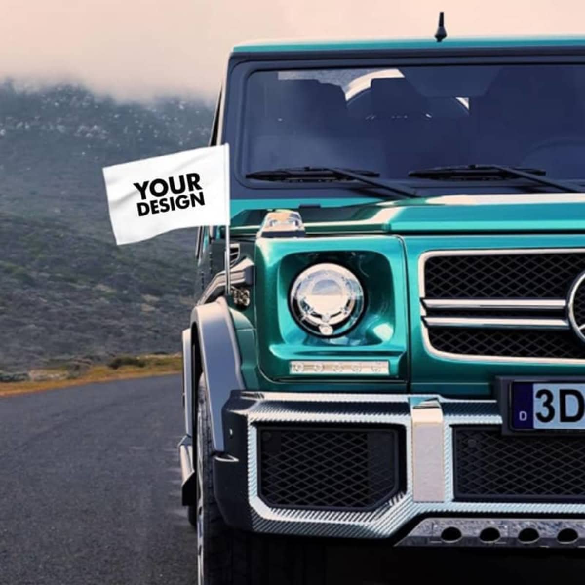 A custom car flag displayed on a teal vehicle, set against a mountainous backdrop. The flag features a design area.