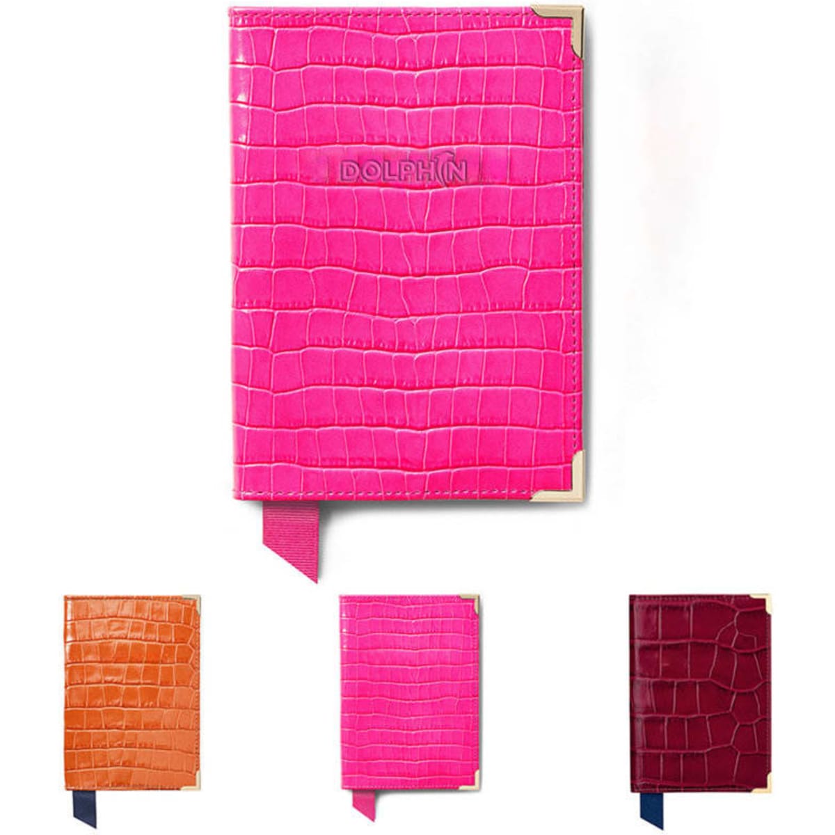 PU leather passport covers in vibrant colours: bright pink, orange, dark pink, and burgundy, featuring a logo.
