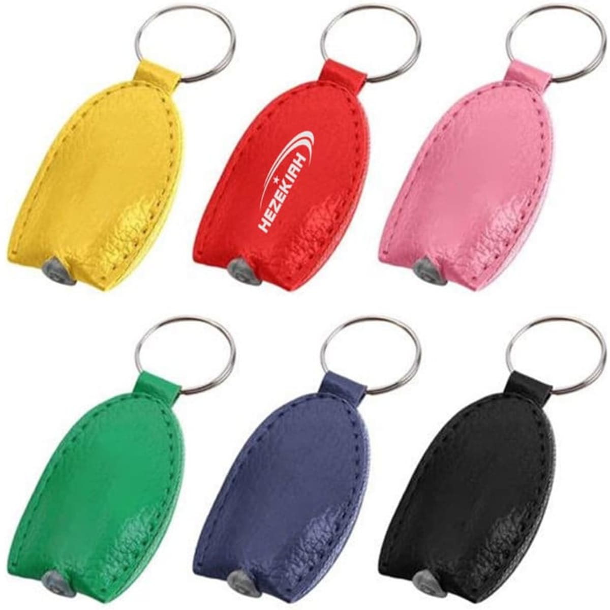 A set of PU leather LED flashlight keychains in yellow, red, pink, green, navy, and black, each with a keyring.