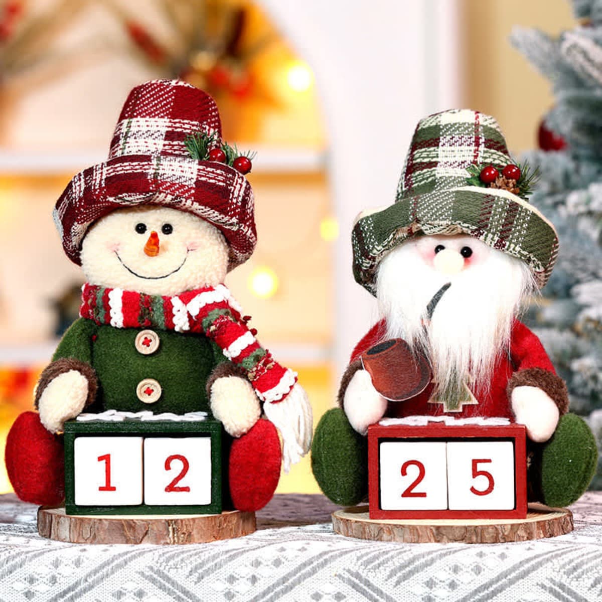 A festive Christmas countdown blocks calendar featuring a snowman and Santa, dressed in red and green with patterned hats.