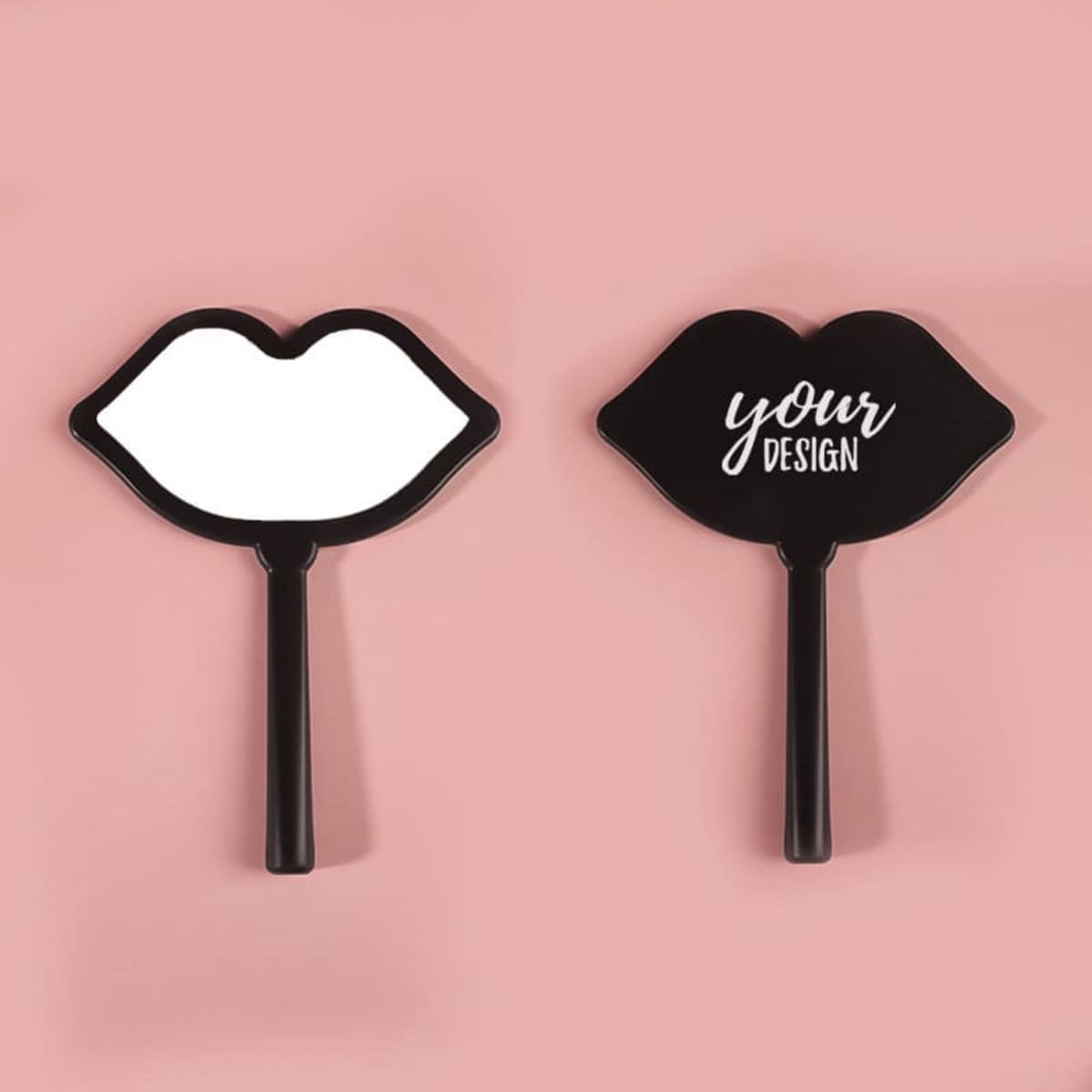 A lip-shaped hand mirror in black, featuring a smooth reflective surface on one side and a design space on the other.