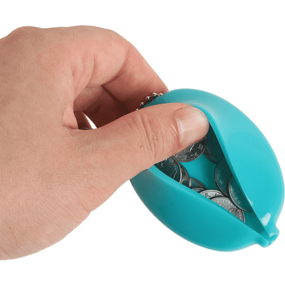 A hand holding a turquoise PVC squeeze oval coin purse filled with coins, showcasing its soft, flexible design.