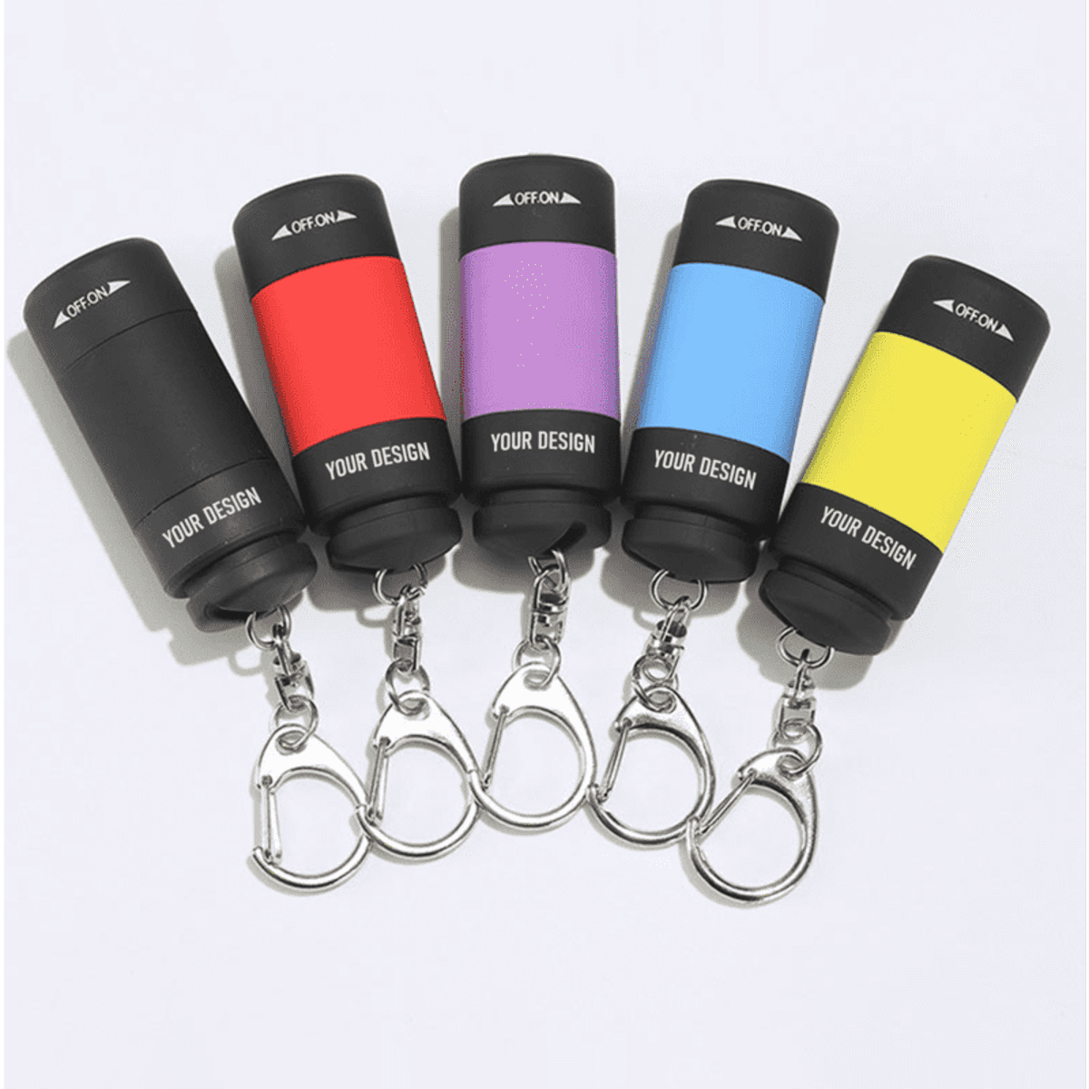 A collection of five LED rechargeable flashlight keychains in black, red, purple, blue, and yellow, featuring attachment clips.