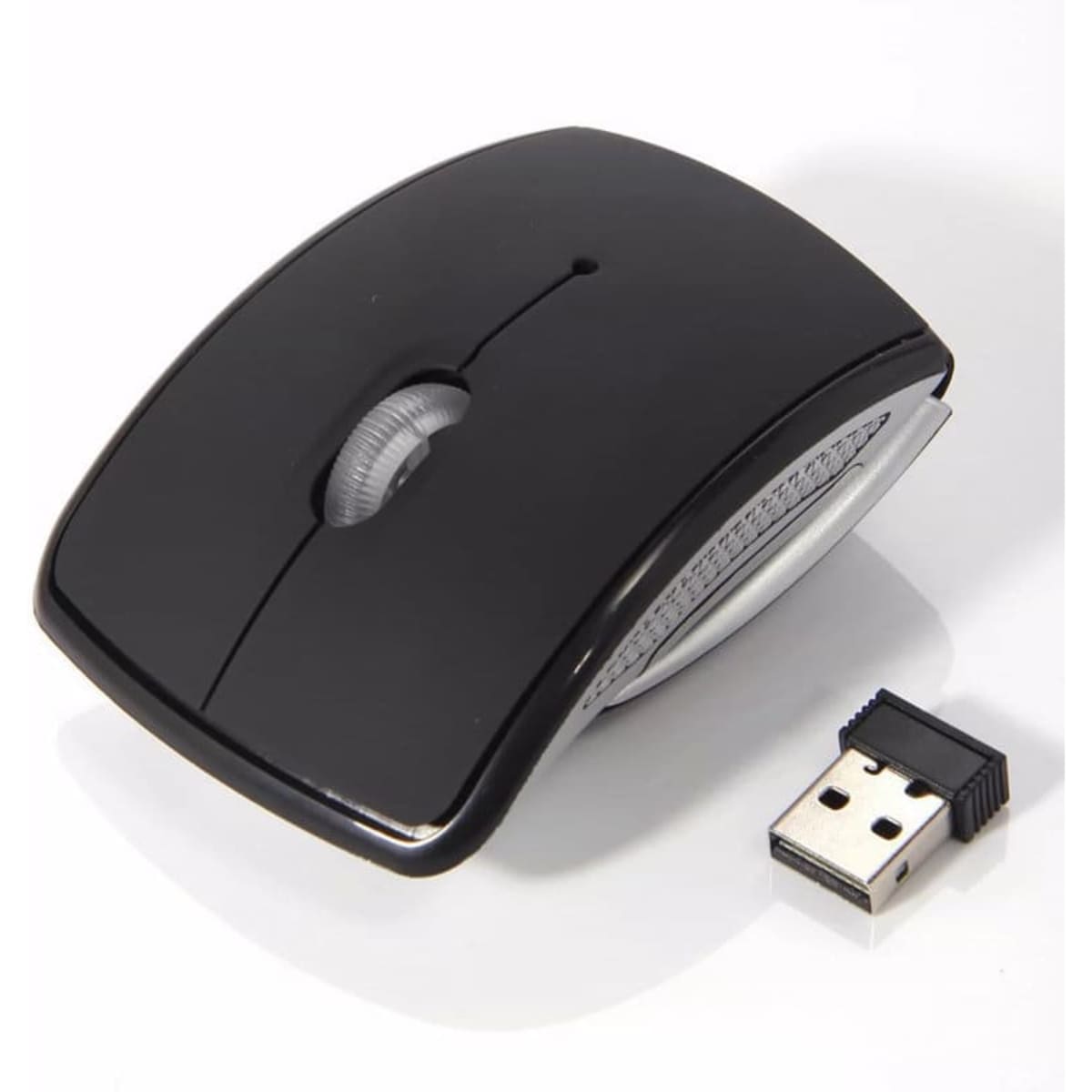 A foldable wireless mouse in black with a USB receiver displayed alongside it. The mouse features a sleek, curved design.