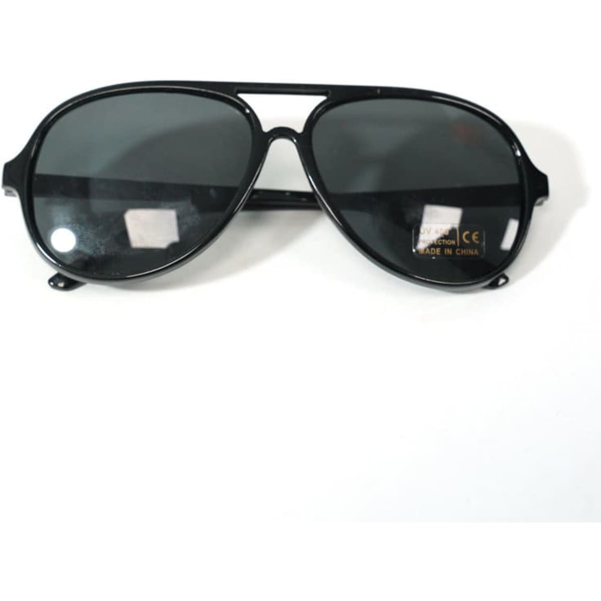 Oversized black polarized aviator sunglasses with dark lenses, featuring a stylish frame and logo.
