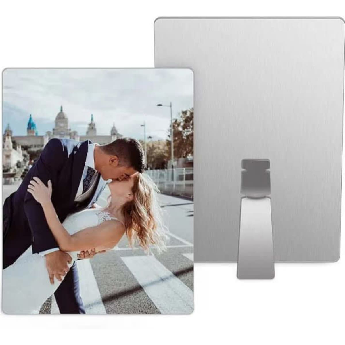 Custom aluminium photo panel featuring a romantic image of a couple kissing, with a sleek metallic back and stand.