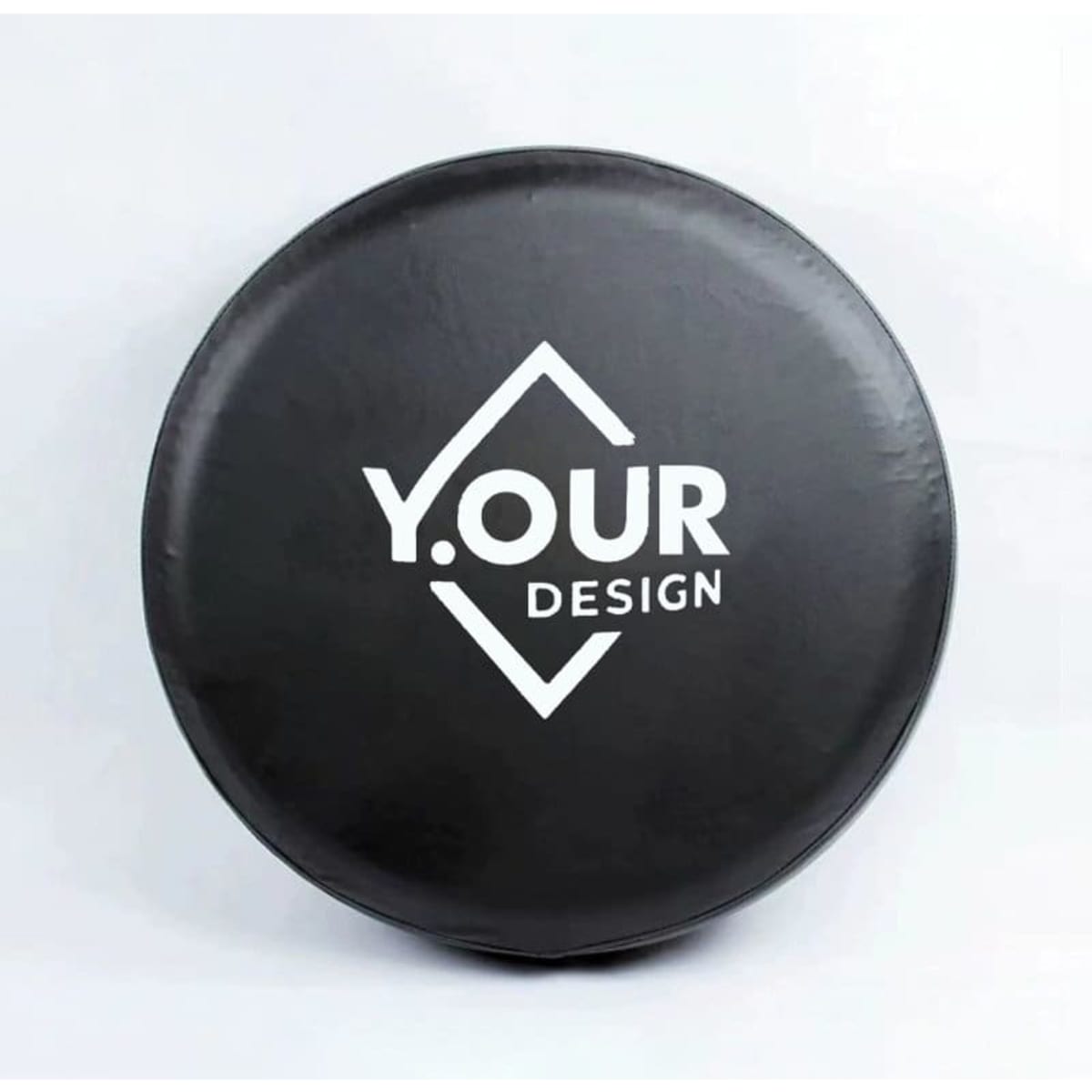 A black spare tire cover featuring a logo design prominently displayed on the front.