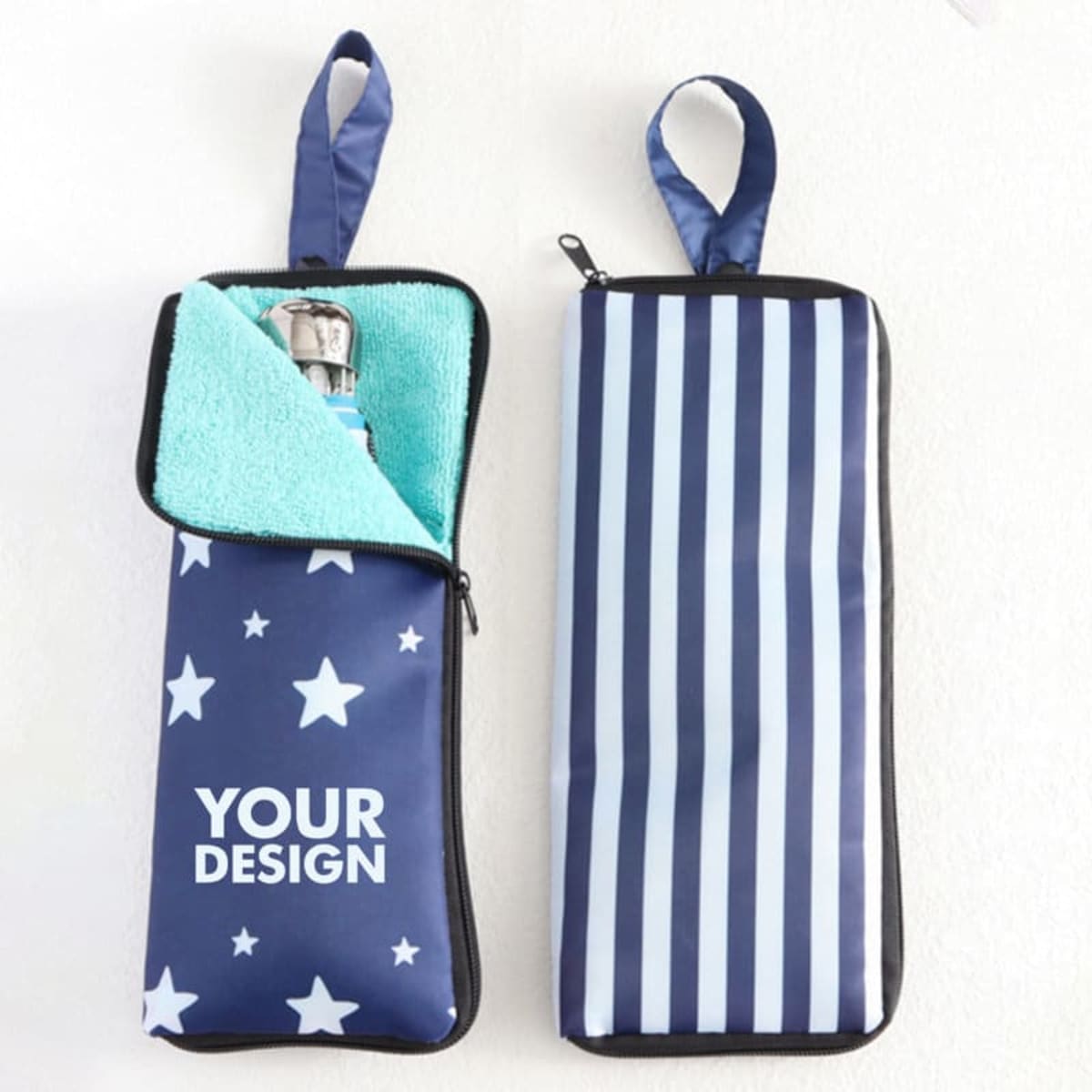 A folding umbrella pouch in navy blue with star patterns and a striped design, featuring a zipped opening and a soft inner lining.
