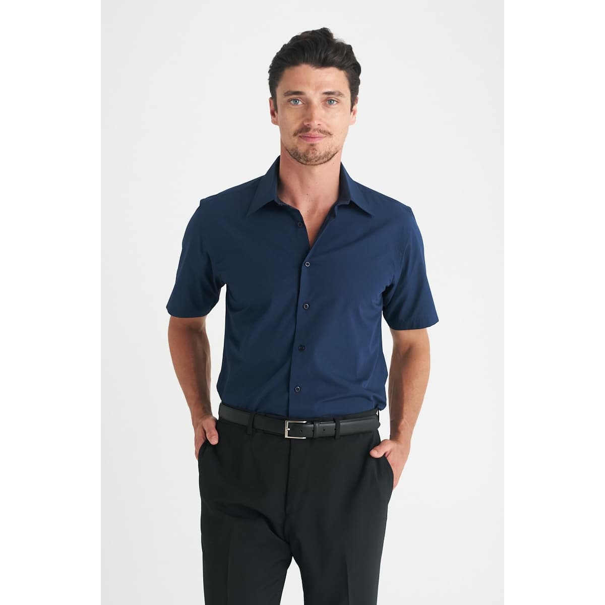 A navy blue short sleeve button-up shirt with a collar, featuring a logo on the chest.