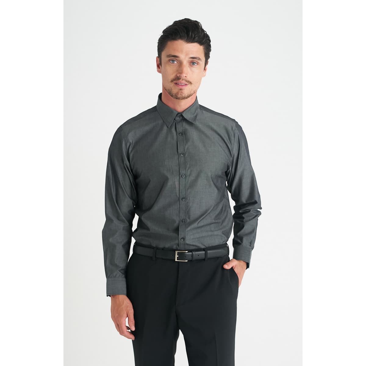 A men's long sleeve button-up shirt in dark grey, featuring a collar and button-front design. It has a logo on it.