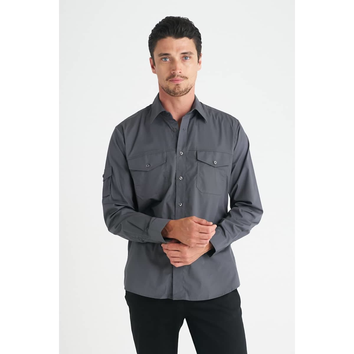 A grey long sleeve button-up shirt for men, featuring two chest pockets and a logo.