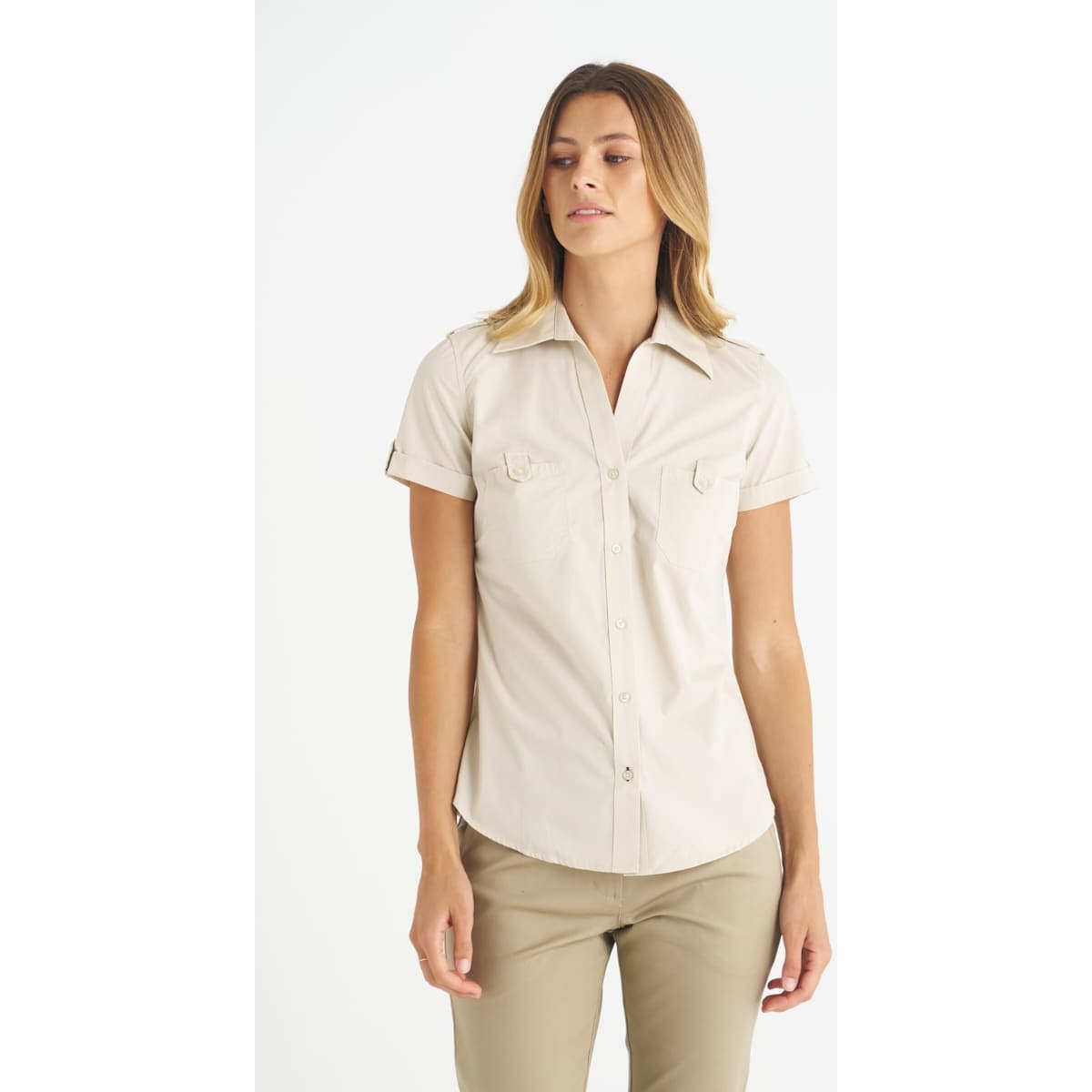 A beige ladies' short sleeve button-up shirt with two chest pockets and a collar.