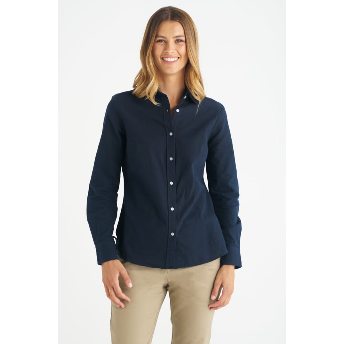 A navy blue long sleeve ladies button-up shirt with a collar and a logo.