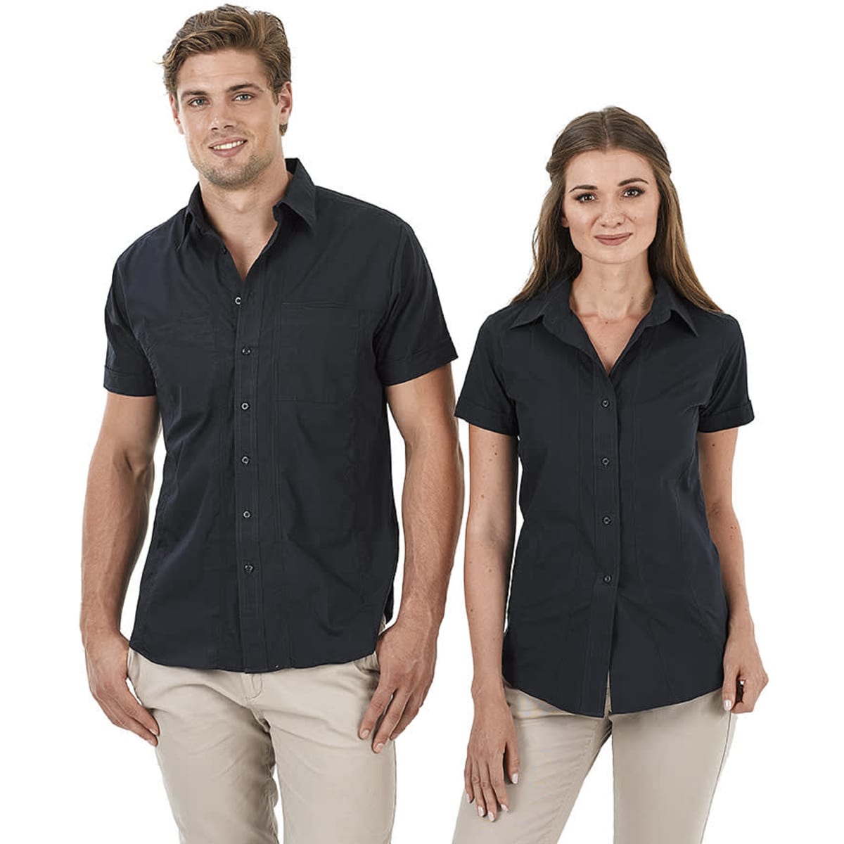 Aston men's and women's short sleeve button-up shirts in navy, featuring a logo and two front pockets.