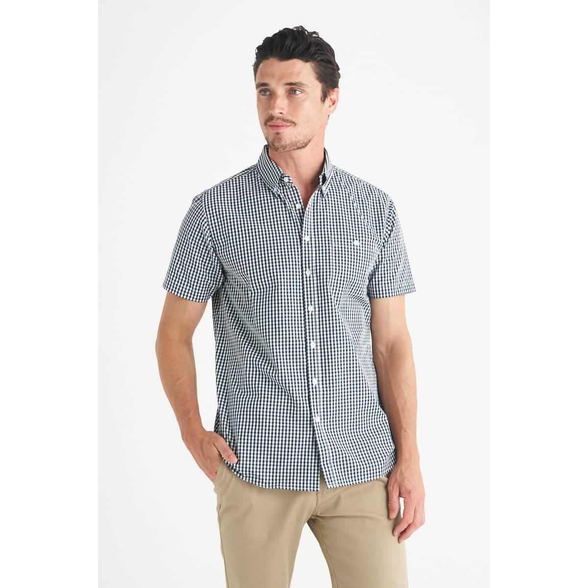 A men's short sleeve button-up shirt featuring a navy and white gingham pattern and a logo.