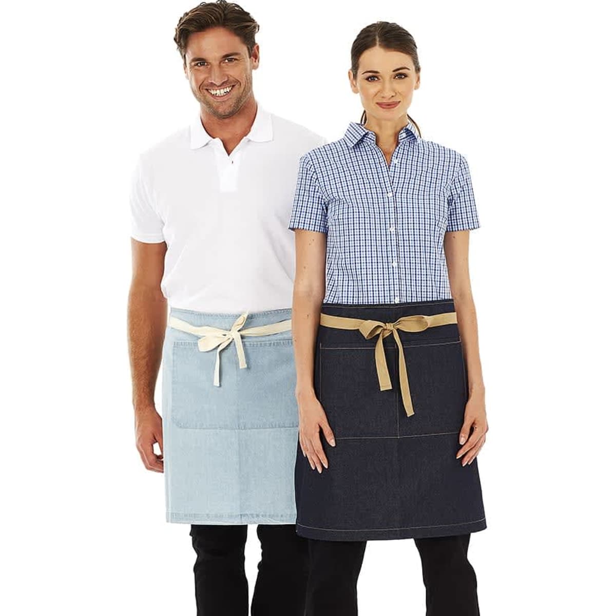 A denim and light denim waist apron worn by a man and woman, both styled casually. The aprons feature a tied belt and pockets.