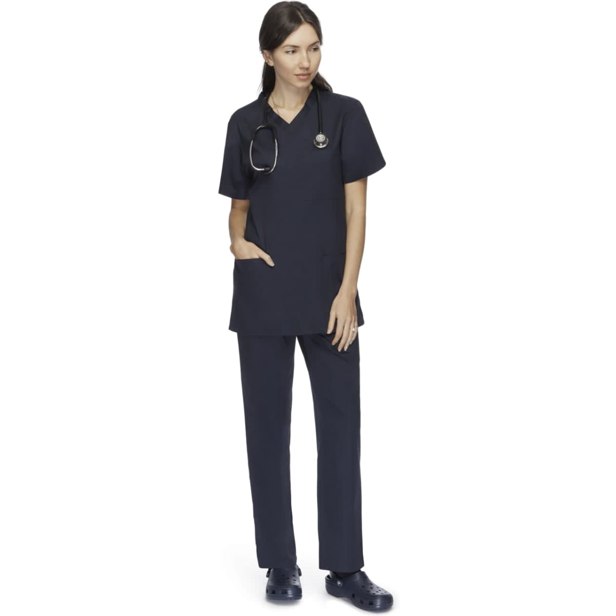 Unisex navy scrubs pants displayed on a model, paired with a matching top and stethoscope.