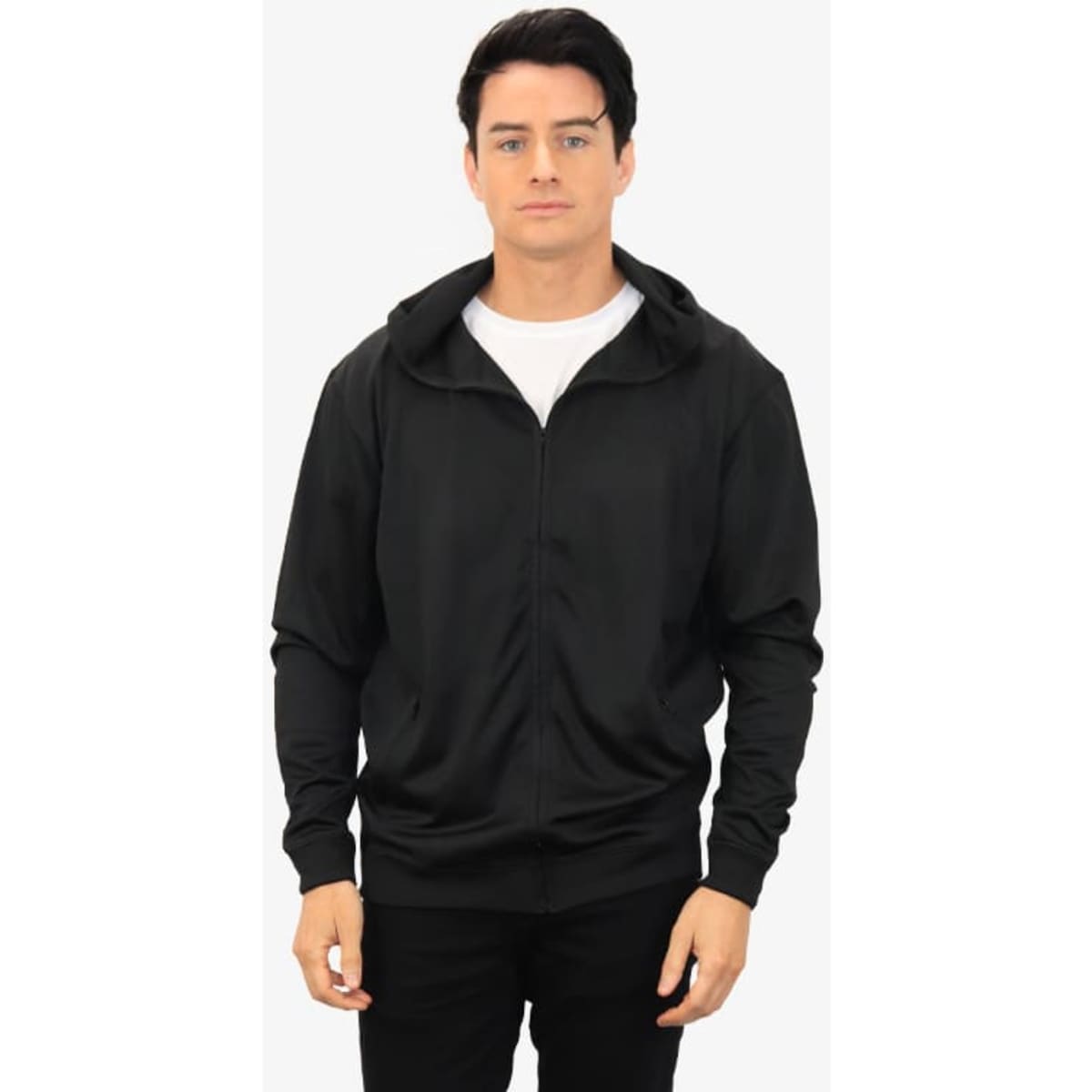 A black hoodie with a zip and a hood, worn by a model. The hoodie has a simple design and includes a logo.