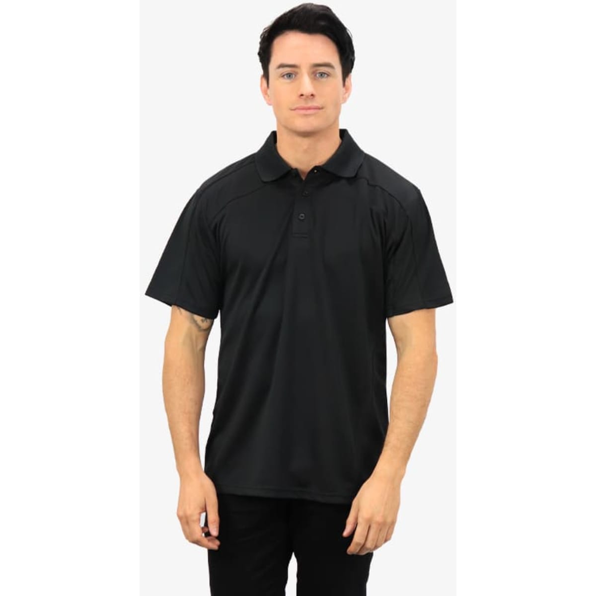 A black polo shirt featuring a collar and short sleeves with a subtle branding logo.