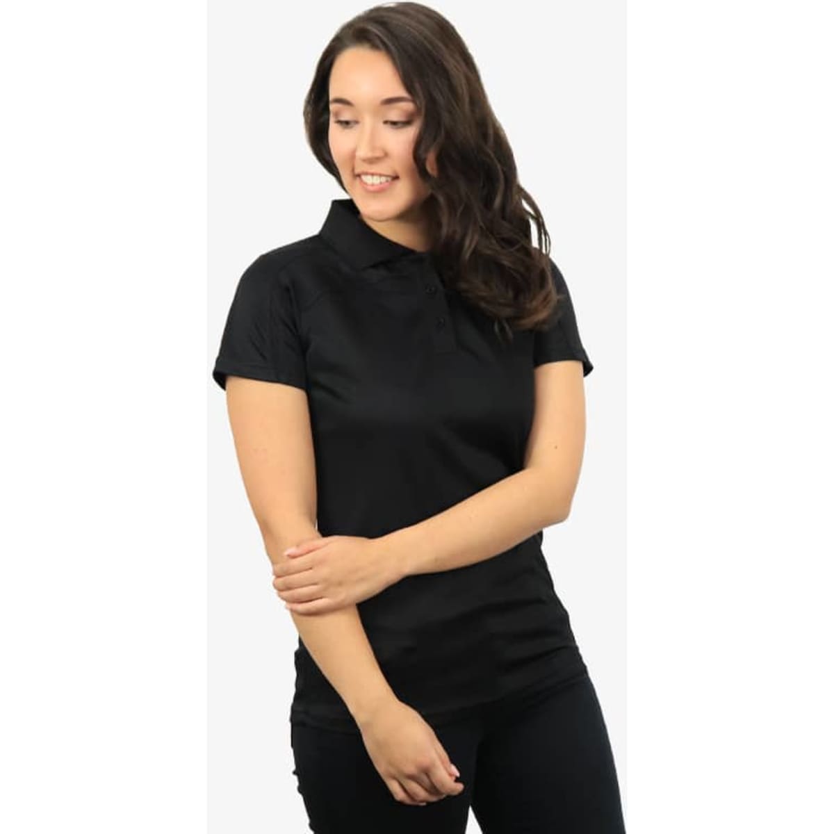 A black polo shirt with a collar, designed for a fitted look, featured on a model smiling.