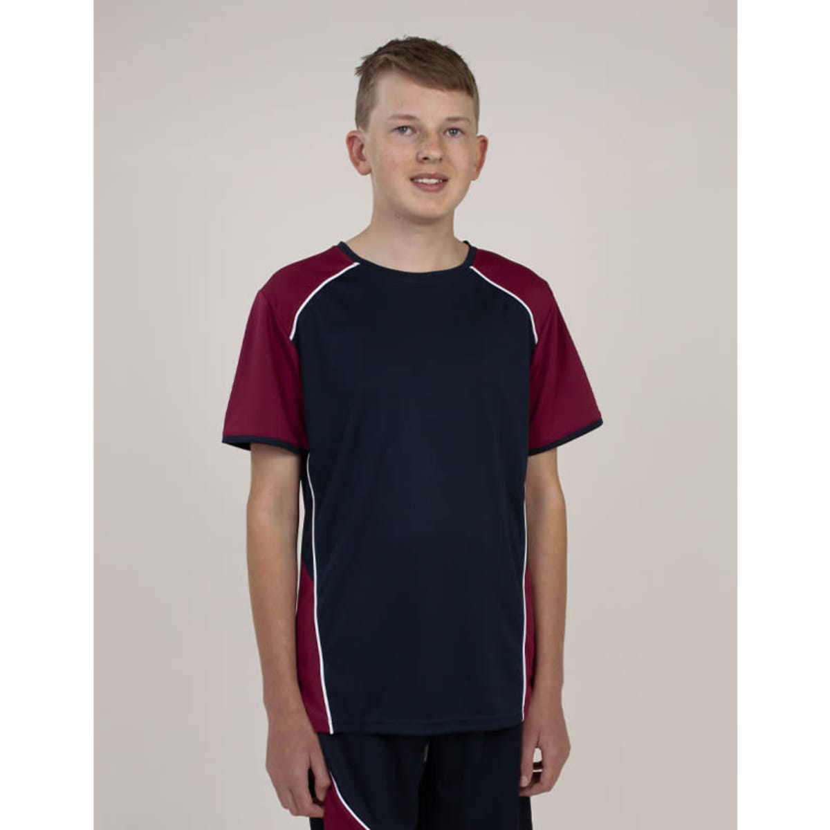 A navy and maroon T-shirt features short sleeves and a slim fit, with contrasting white seams and a logo.